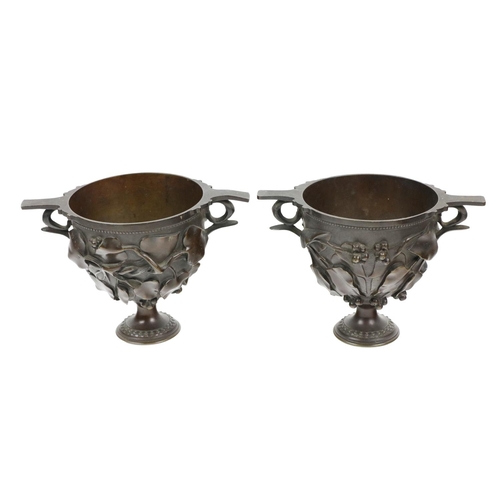 1088 - After the AntiqueA pair of attractive bronze Roman inspired twin handled cup 