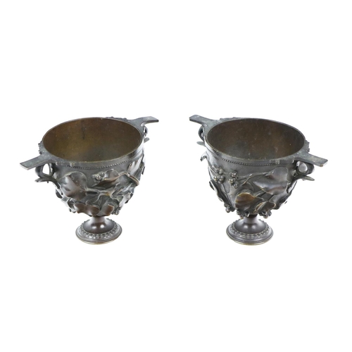 1088 - After the AntiqueA pair of attractive bronze Roman inspired twin handled cup 