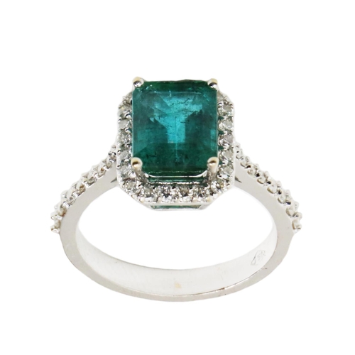 146 - A fine quality Ladies diamond and emerald Ring, set with a 2.36ct center emerald, and approx. .33ct ... 