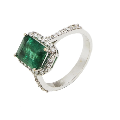146 - A fine quality Ladies diamond and emerald Ring, set with a 2.36ct center emerald, and approx. .33ct ... 