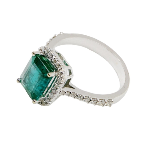 146 - A fine quality Ladies diamond and emerald Ring, set with a 2.36ct center emerald, and approx. .33ct ... 