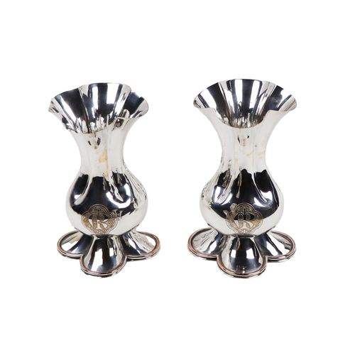 2 - Silverware: A pair of Arts and Crafts design in the manner of A.W. Pugin Altar Candlesticks, each of... 