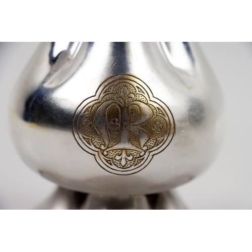 2 - Silverware: A pair of Arts and Crafts design in the manner of A.W. Pugin Altar Candlesticks, each of... 