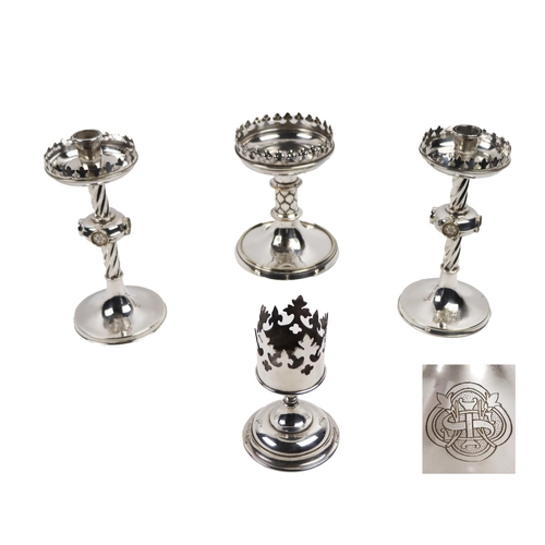 2 - Silverware: A pair of Arts and Crafts design in the manner of A.W. Pugin Altar Candlesticks, each of... 