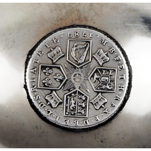 54 - A silver and turned ebonised handle Brandy Ladle, with etched monogram and central George III coin. ... 