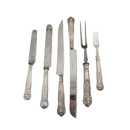 7 - Silverware: A collection of Kings pattern silver handled flatware, comprising two carving knives and... 