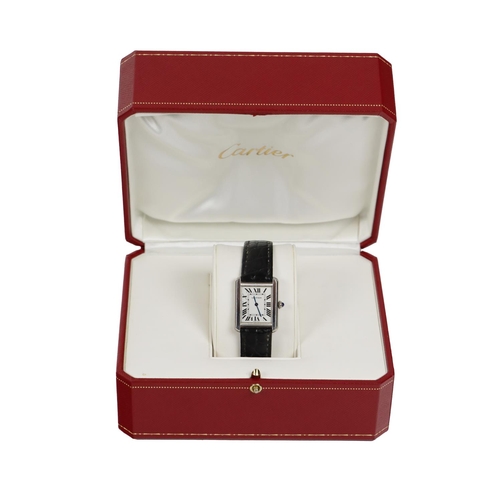 175 - A Ladies Cartier Tank Solo Wrist Watch, with steel case, silver dial and Roman numerals, with push/p... 