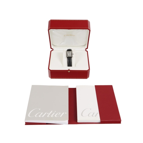 175 - A Ladies Cartier Tank Solo Wrist Watch, with steel case, silver dial and Roman numerals, with push/p... 
