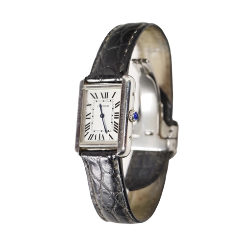 175 - A Ladies Cartier Tank Solo Wrist Watch, with steel case, silver dial and Roman numerals, with push/p... 