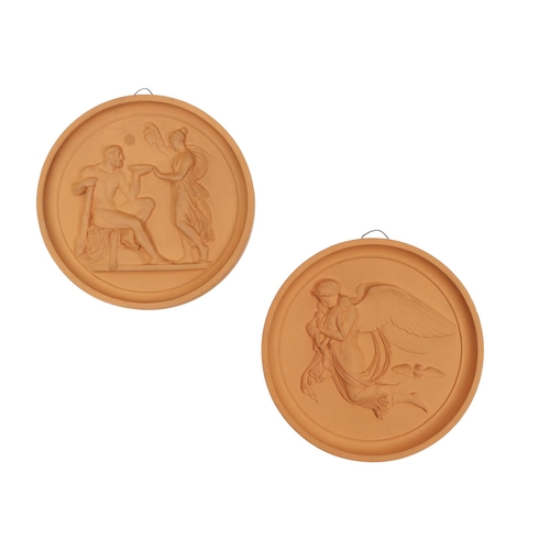 384 - An attractive pair of Danish terracotta circular wall relief Plaques, 22cms (8 3.4