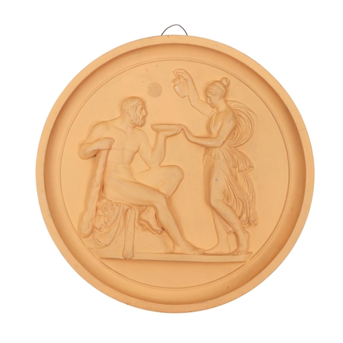 384 - An attractive pair of Danish terracotta circular wall relief Plaques, 22cms (8 3.4
