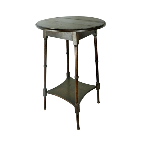 61 - A 19th Century oak Occasional Table, with circular moulded top on simulated bamboo outsplayed legs, ... 