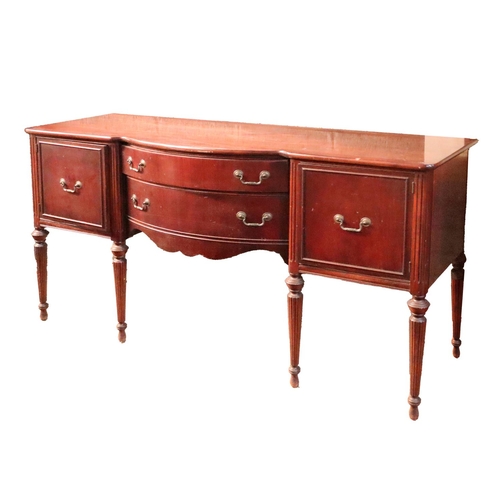 29 - An attractive mahogany bow fronted Sideboard, with plain top over low center with two drawers flanke... 