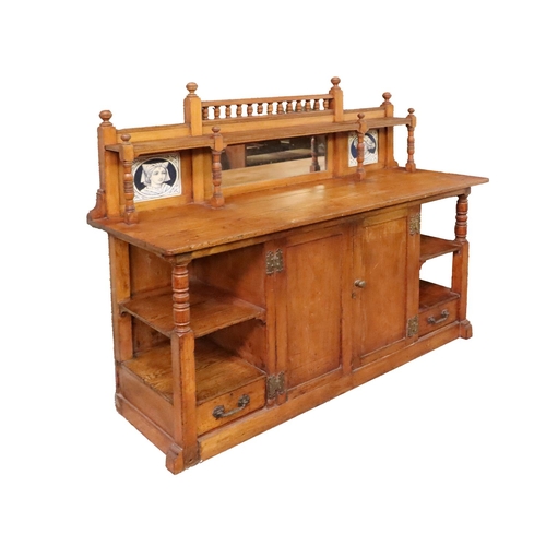 35 - An attractive carved and turned oak English Arts & Crafts period Sideboard, possibly by Morris &... 