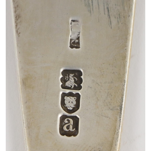 26 - A large Kings pattern design silver Serving Spoon, with crested and shell capital together with matc... 