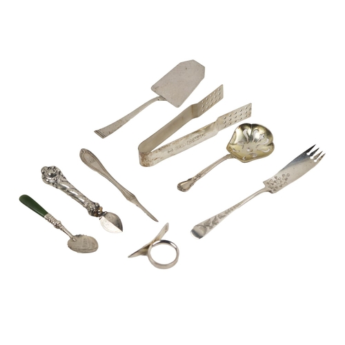 32 - Silverware: An English silver Orange Peeler, London, E.P. Degavino, 2003; an agate handled and leaf ... 