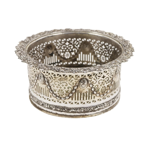 37 - A large silver plated pierced and decorated Coaster or Flower Holder, designed with vine leaf and gr... 