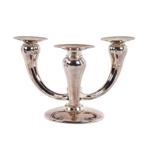 41 - An attractive silver Art Deco design three branch Candelabra, by H.E. Waldstetten, Baden (Germany) c... 