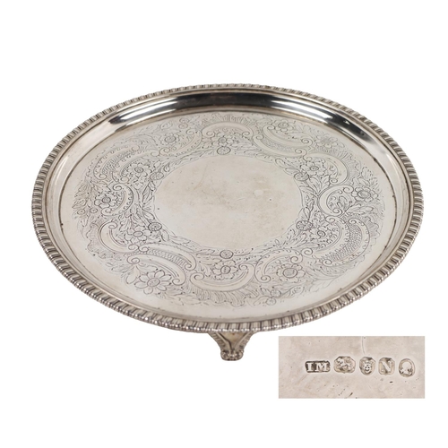 50 - A heavy good quality Georgian English silver circular Tray, with moulded edge and floral etched cent... 