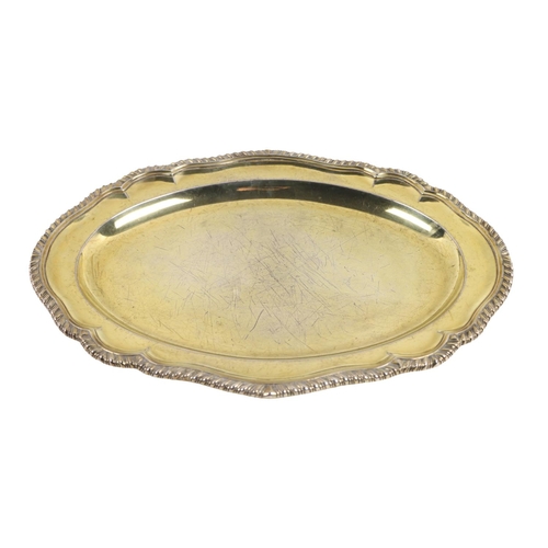 55 - A fine quality Georgian silver gilt oval Tray, with shaped gadroon edge and recessed center, approx.... 