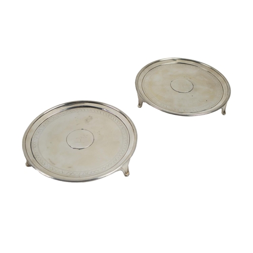 140 - A pair of Irish 18th Century crested silver Salvers, by Joseph Jackson, Dublin 1791, each with 'Denn... 