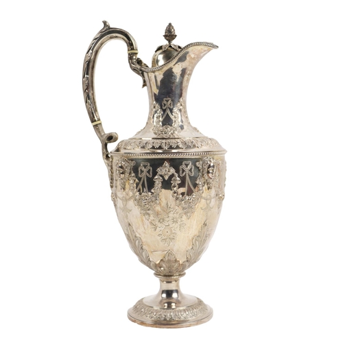 123 - A fine quality Victorian Adams design silver Claret Jug, with overall etched and relief design with ... 