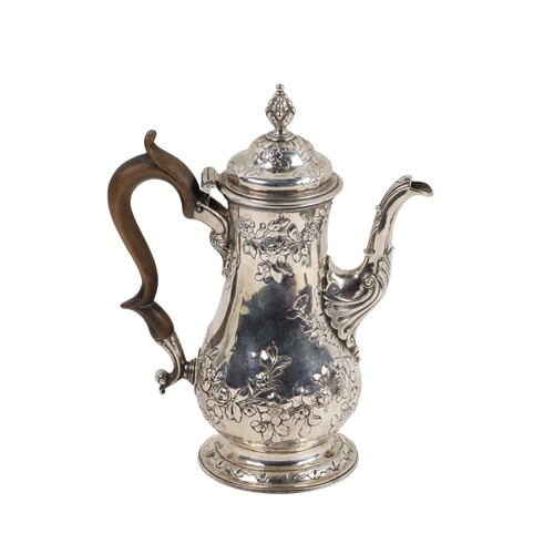 124 - A large quality 18th Century George II English silver Coffee Pot, of repouss&eacute; floral decorate... 