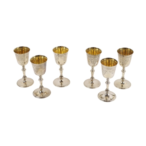 126 - A good quality set of 6 Irish silver Wine Goblets, with gilded interiors, and etched bowls on turned... 