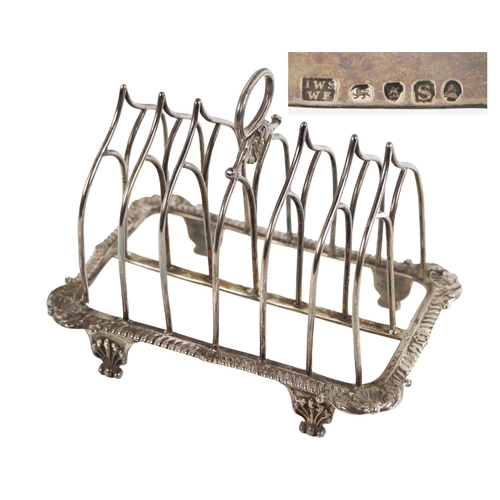 130 - A fine quality early 19th Century Gothic design Toast Rack, with gadroon border and shell decoration... 