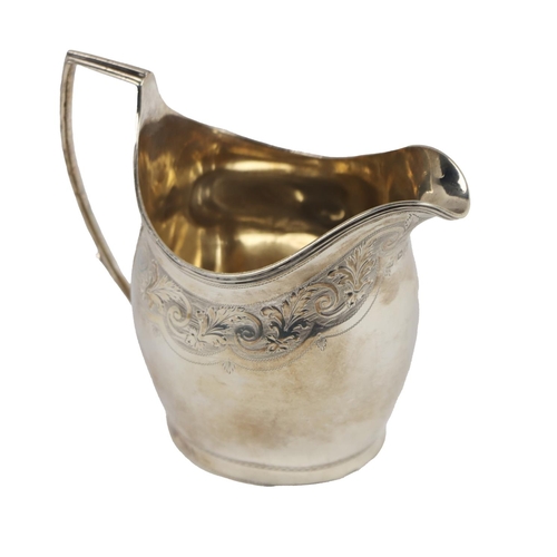 132 - A Georgian English silver bright-cut helmet shaped Cream Jug, with reeded edge and shaped handle, ha... 