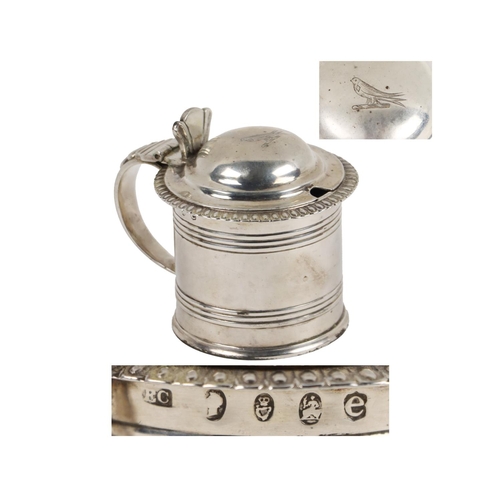 133 - A quality Irish Georgian silver tankard design Mustard Pot, with blue glass liner, the hinged top wi... 