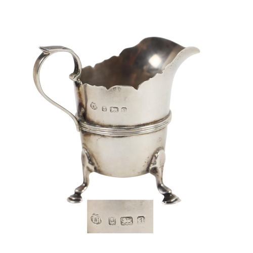 139 - An attractive late Victorian English silver Cream Jug, of small proportions, with scroll handle and ... 