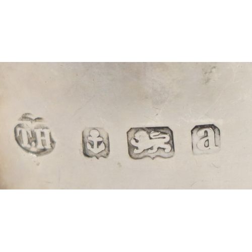 139 - An attractive late Victorian English silver Cream Jug, of small proportions, with scroll handle and ... 