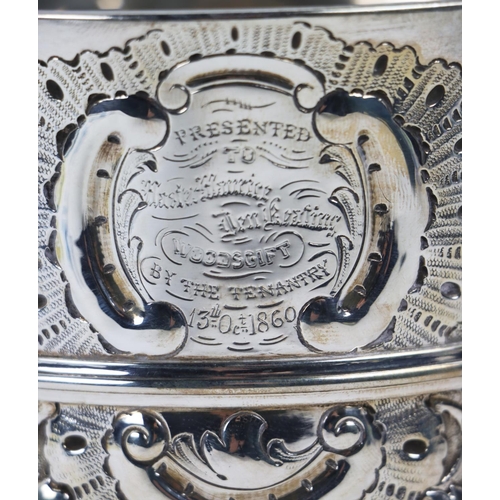 142 - A fine quality Irish silver 19th Century two handled Trophy Cup, the overall of repoussé design with... 