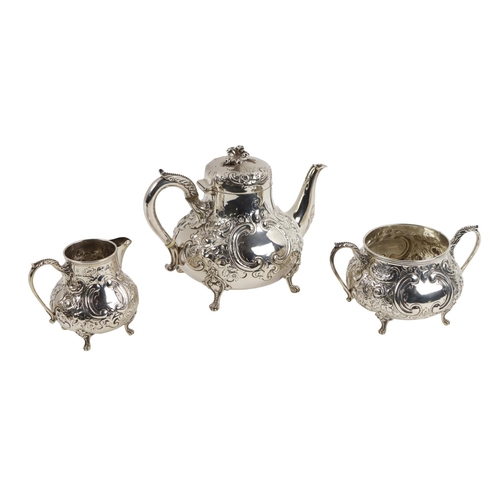 145 - A quality three piece Victorian ornate Tea Set,&nbsp;with overall repouss&eacute; floral decoration,... 
