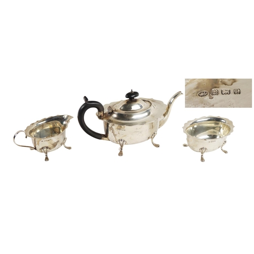 151 - A three piece Edwardian silver Tea Service, comprising teapot, cream jug and sugar bowl, each with s... 