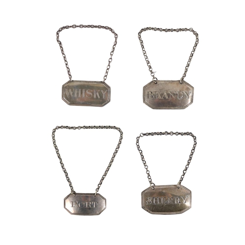 152 - A group of four Georgian silver Drinks Labels, marked Port, Whisky, Sherry and Brandy, hallmarked Lo... 