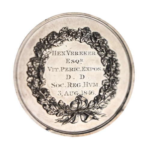 163 - Medal: [Irish Interest] A silver circular Medal, the obverse with central cherub and inscribed 'Late... 