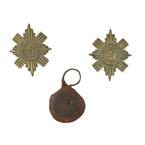 174 - A pair of brass Military Badges, Scots Guards, World War II and a Turkana Tribal Fighting Knife. (3)... 