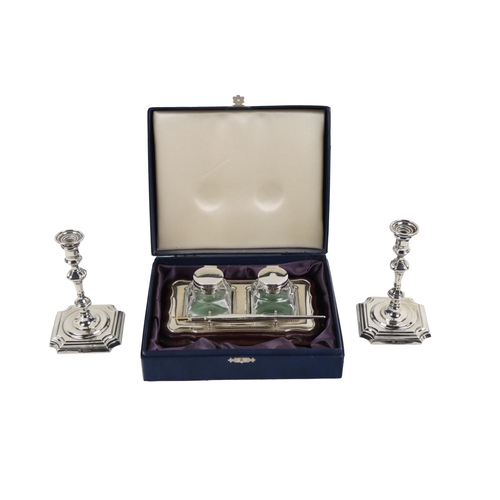 48 - A pair of attractive silver miniature Georgian style Candlesticks, of turned design on shaped base, ... 