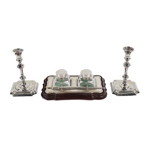 48 - A pair of attractive silver miniature Georgian style Candlesticks, of turned design on shaped base, ... 