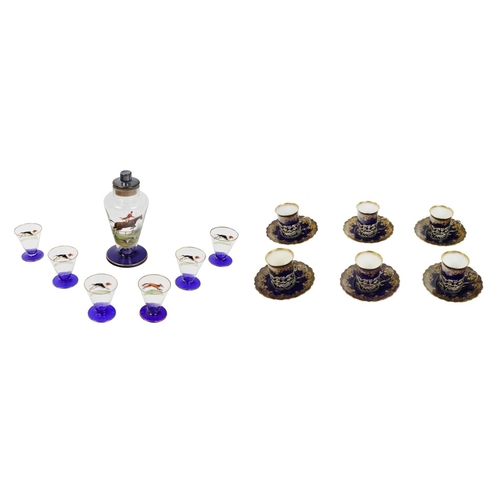 1003 - A small Ansley china set of 6 Coffee Cups, with embossed and pierced silver holders and 6 matching s... 