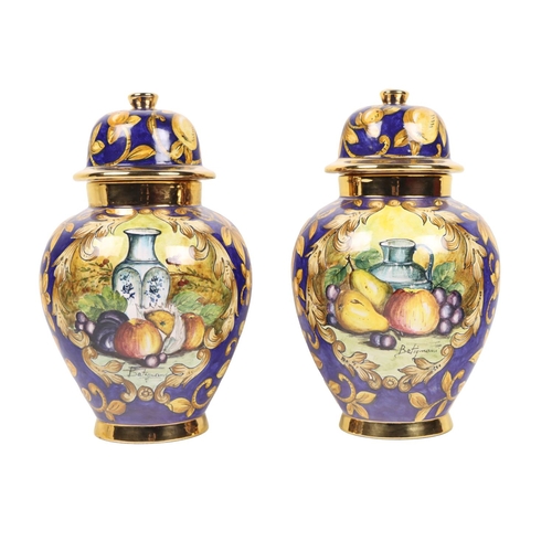1203 - An attractive pair of Italian fruit decorated Urns & Covers, by Batiquani of Italy, approx. 30cm... 