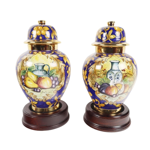 1203 - An attractive pair of Italian fruit decorated Urns & Covers, by Batiquani of Italy, approx. 30cm... 