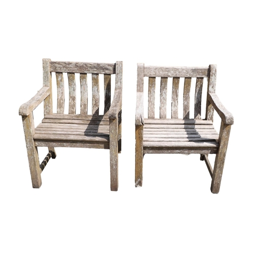 25 - A suite of wooden Patio Furniture, by Alexander Rose Ltd., comprising bench, two armchairs and two s... 