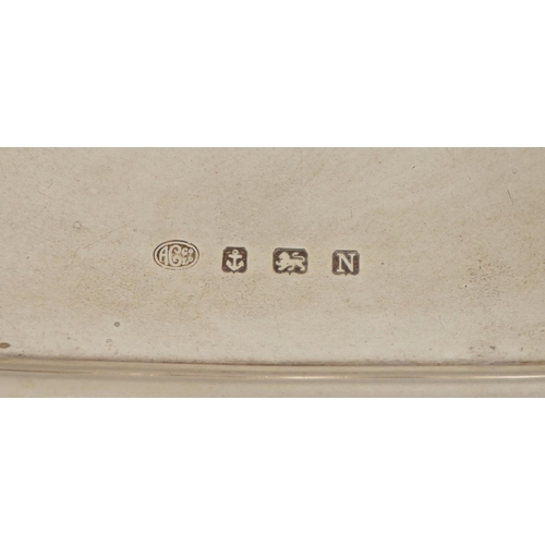 37 - A heavy English silver Tray, with moulded shaped edge, inscribed '7.9.38,' Benin Province, with cros... 