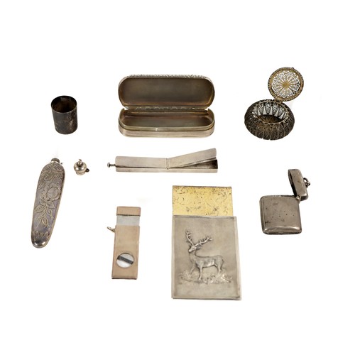 6 - Silverware: An interesting collection of items, including an embossed and chased stag design Victori... 