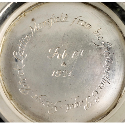 21 - A heavy English silver two handled Porringer, with scroll handles, with repoussé leaf form design, h... 