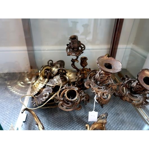 10 - A collection of assorted brass candle sconces,light fittings etc.