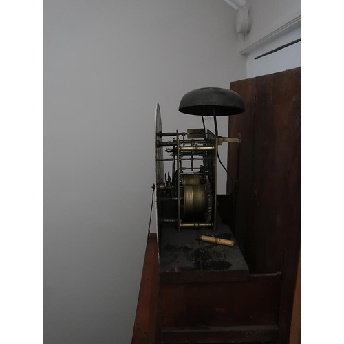 2 - A Victorian mahogany cased longcase clock, arched hood enclosing enamel face, the plain trunk on rai... 